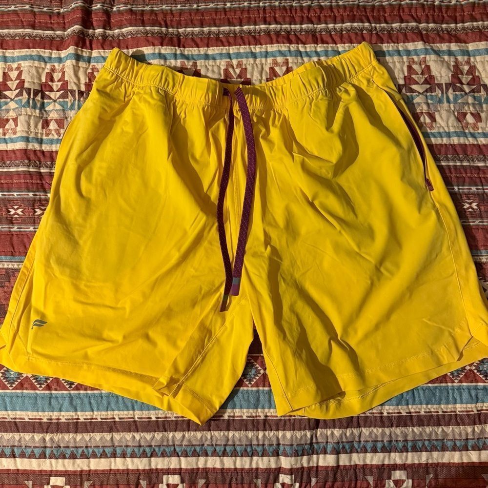 Fabletics men’s Vibrant Yellow Athletic Shorts with Purple Drawstring size XL